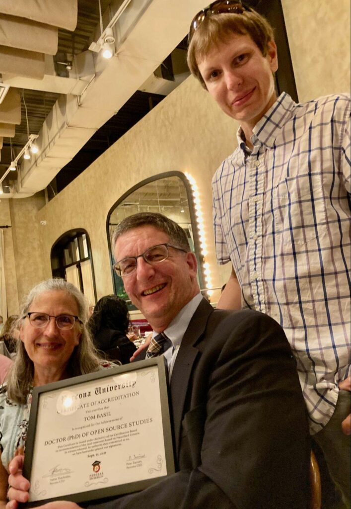 Peter awards Tom a Percona University PhD!