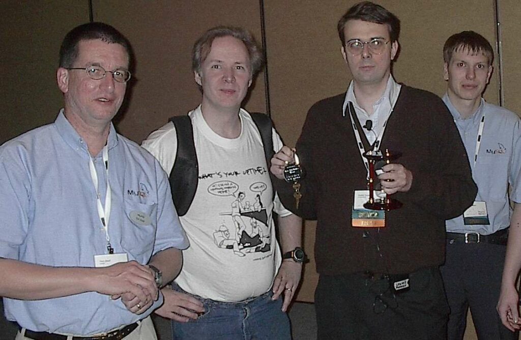 Tom, Monty Widenius (MySQL Founder), Heikki Turri (InnoDB Creator), & Peter, at the 2nd ever MySQL User Conference, 2004